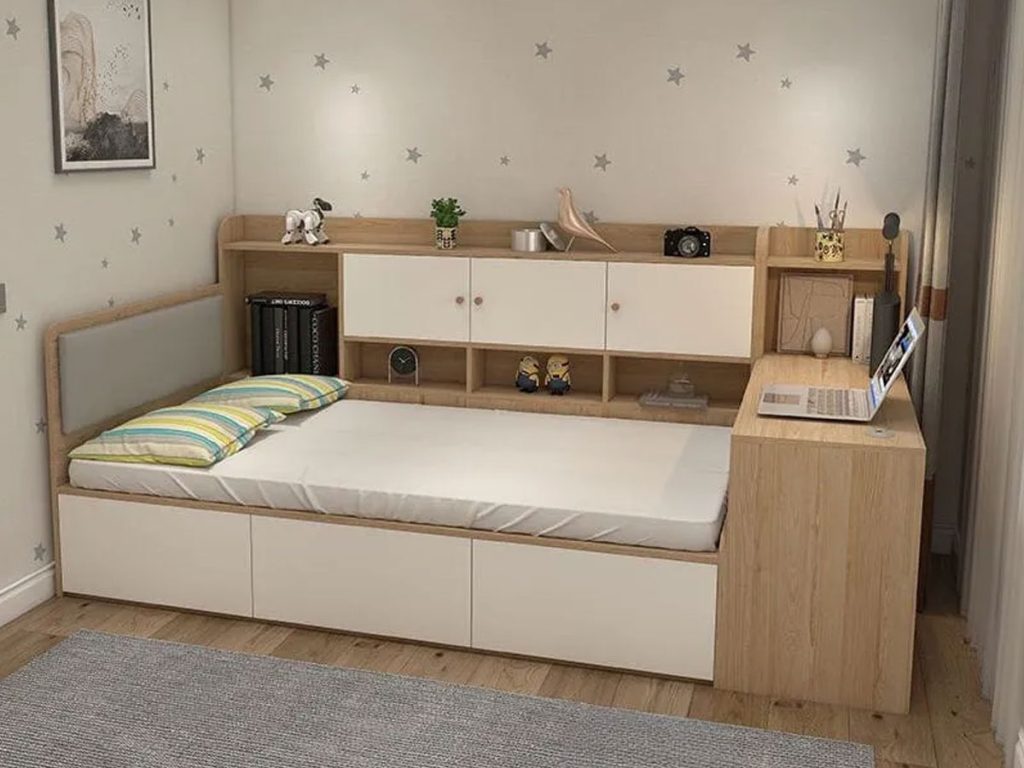 Hình ảnh minh họa giải pháp nội thất đa năng container hoàn hảo: một chiếc giường gấp (Murphy bed) được giấu kín. Khi giường được gấp lên, nó biến thành một mặt bàn làm việc hoặc văn phòng hiện đại. Cơ chế chuyển đổi nhanh chóng này giúp tối ưu hóa bố cục nhà nhỏ, phục vụ hai chức năng riêng biệt mà không lãng phí không gian.